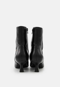 Bons baisers Bottes Et Bottines|Clarisse